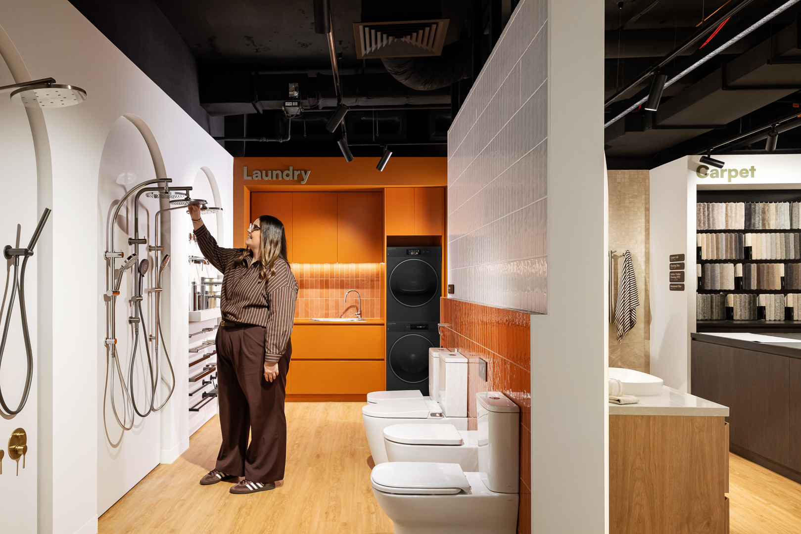 Comparing shower fittings at Elle Design Studio