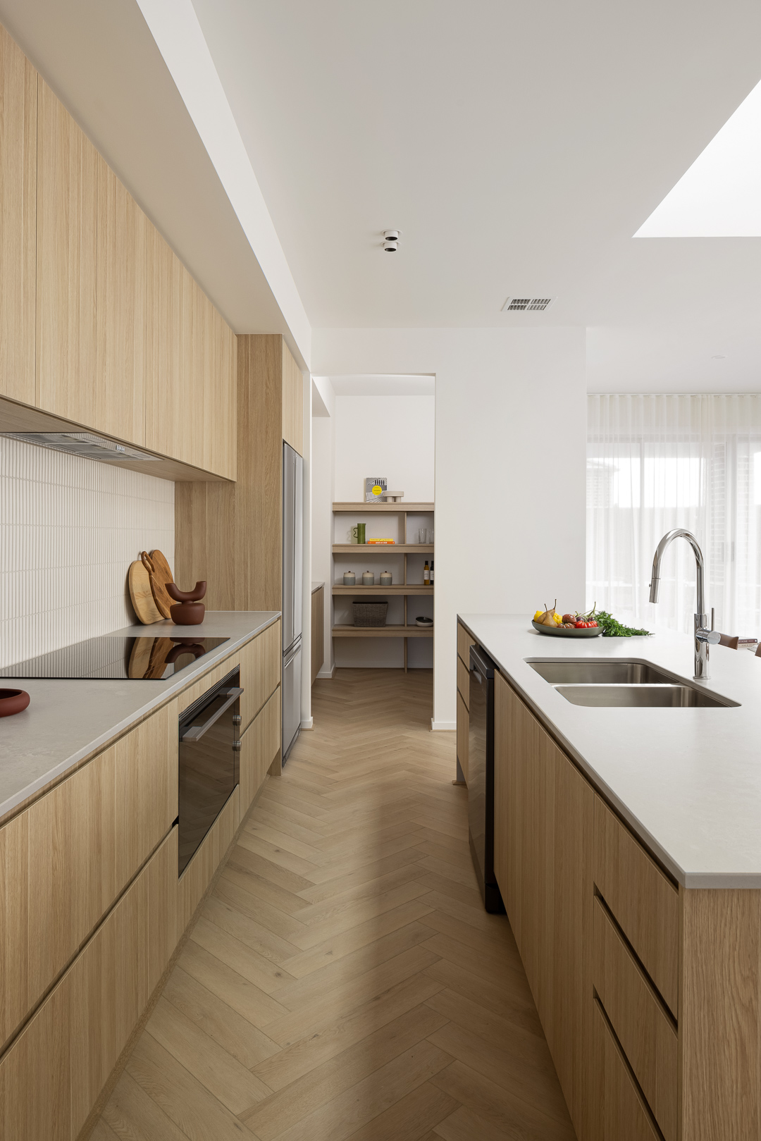 Mayde Homes kitchen cabinetry and storage in a modern first home